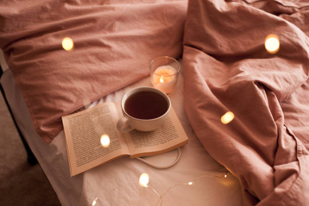 istock Cup of coffee over lights 1277132559