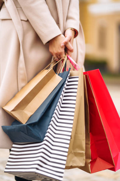 istock Shopping bags in the hands. 1277132633