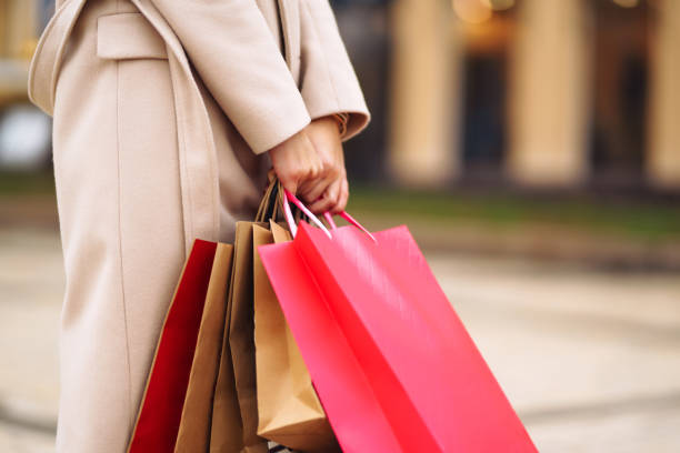istock Shopping bags in the hands. 1277132759