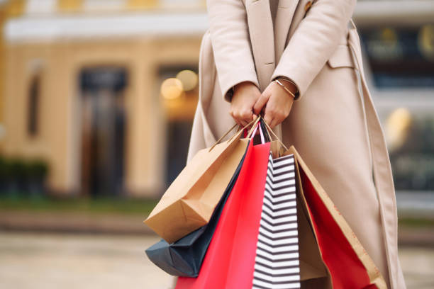 istock Shopping bags in the hands. 1277132823