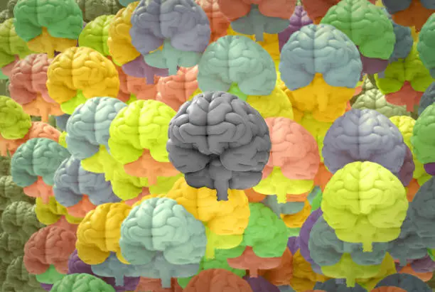 Photo of 3D rendering crowd of monochrome and colorful  human brains illustration