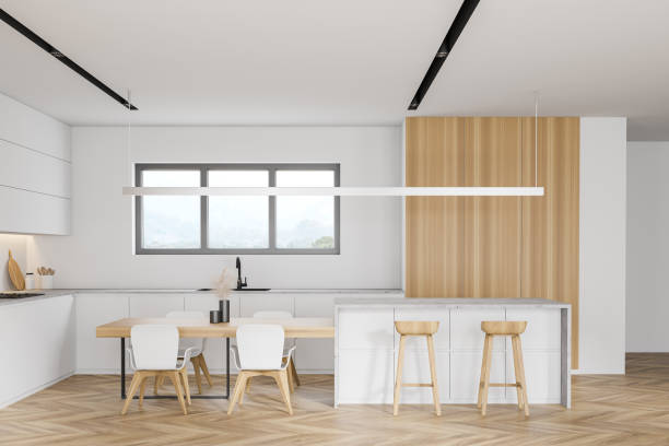 istock Stylish white and wooden kitchen with bar 1277138056