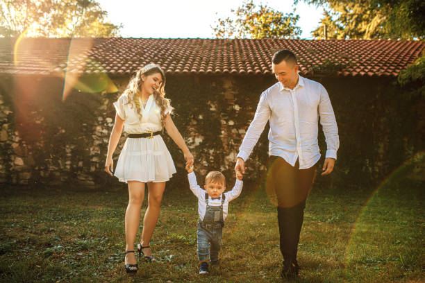 istock Happy family playing in the park 1277138555