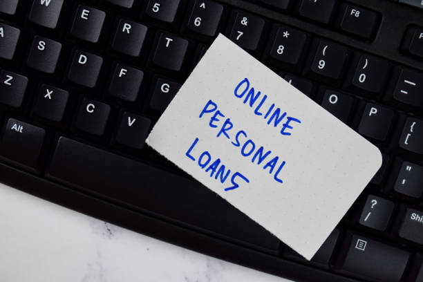 istock Online Personal Loans text on sticky notes isolated on office desk. 1277138762