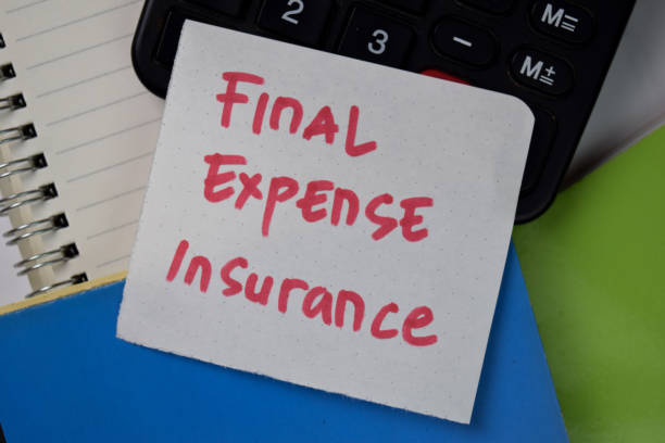 istock Final Expense Insurance text on sticky notes isolated on office desk. 1277138866