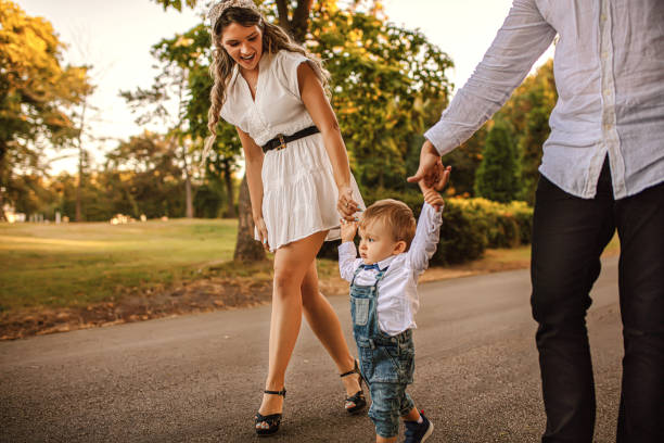 istock Happy family playing in the park 1277139890
