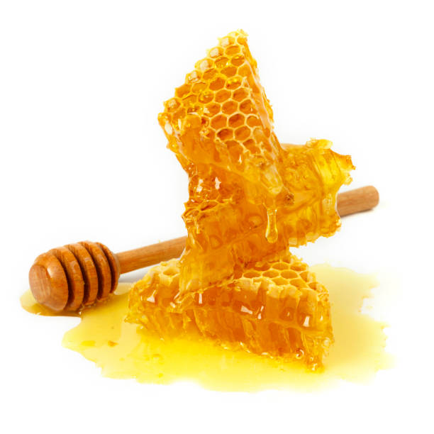 istock Honeycomb and curative propolis isolated on white background. Wild bee honey 1277140597