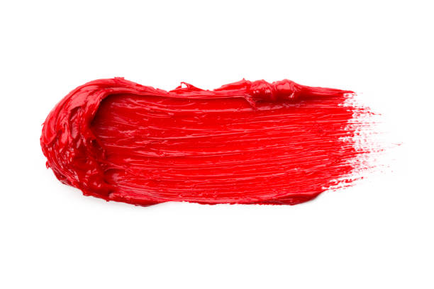 istock Lipstick smear smudge swatch isolated on white background. Cream makeup texture. Bright red color cosmetic product brush stroke swipe sample 1277141689