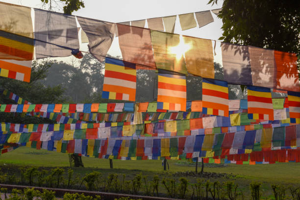 Prayer flags at Maya Devi temple birth place of Buddha in Lumbini, Nepal Prayer flags at Maya Devi temple birth place of Buddha in Lumbini on Nepal lumbini nepal stock pictures, royalty-free photos & images