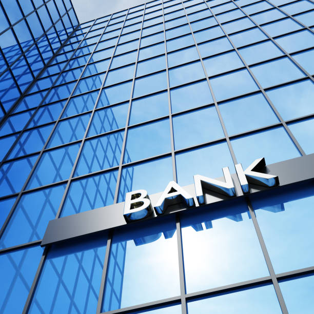 istock Bank sign on a modern glass building. 3D render. 1277143097