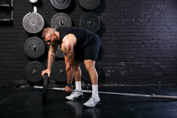 istock Setting up the weightlifting equipment 1277144282