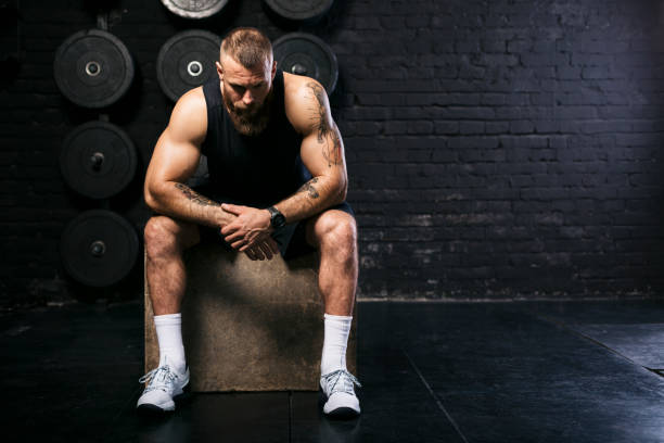 istock Handsome bearded Caucasian man taking a break in the gym 1277144804