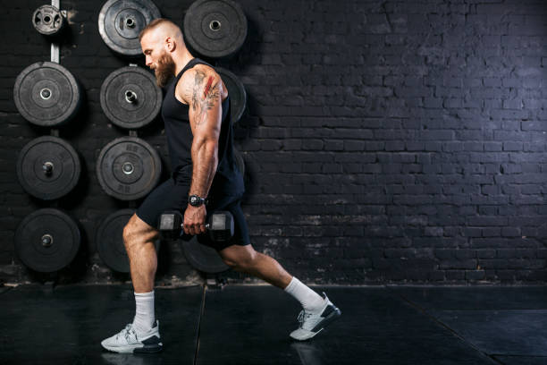 istock Big Caucasian male bodybuilder training at the gym 1277144975