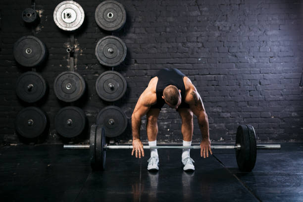 istock Muscular Caucasian bodybuilder training at the gym 1277145002