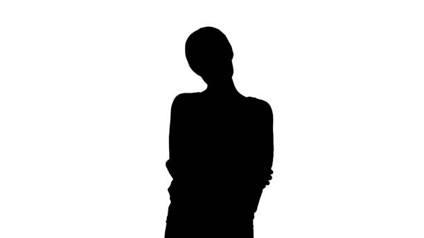istock Silhouette Young smiling woman waving her hand as a greeting loo 1277146453