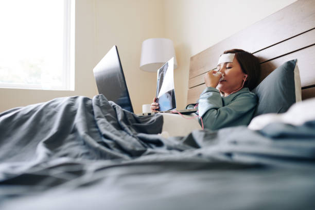 istock Sick woman looking at chest x-ray 1277147084