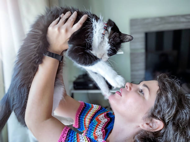 istock Beautiful woman with her pet. 1277149648