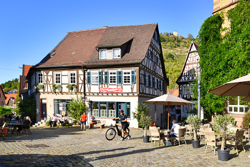 Heppenheim, Germany - Market place with beautiful old haf timbered  buildings in historic city center of Heppenheim on sunny day