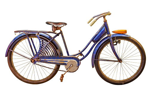 Vintage rusted blue beach cruiser bicycle isolated on a white background