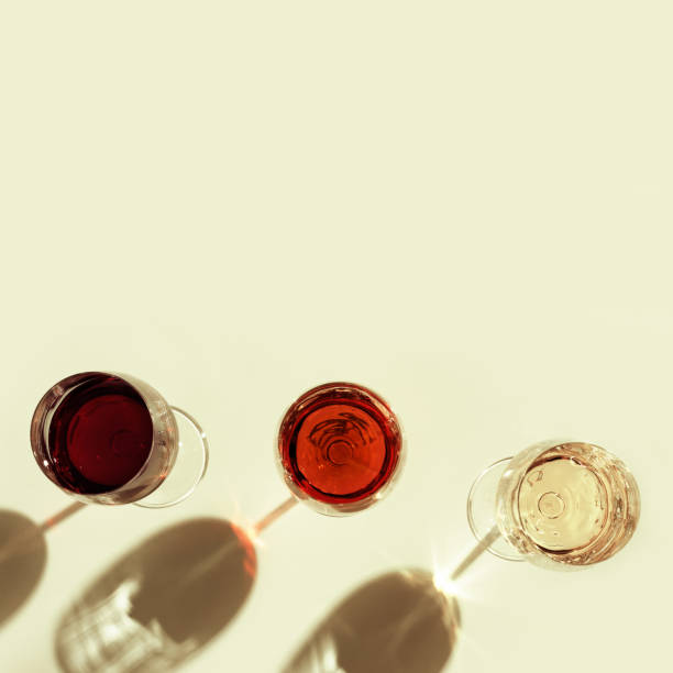 istock Red, rose and white wine top view, vintage toned 1277159892