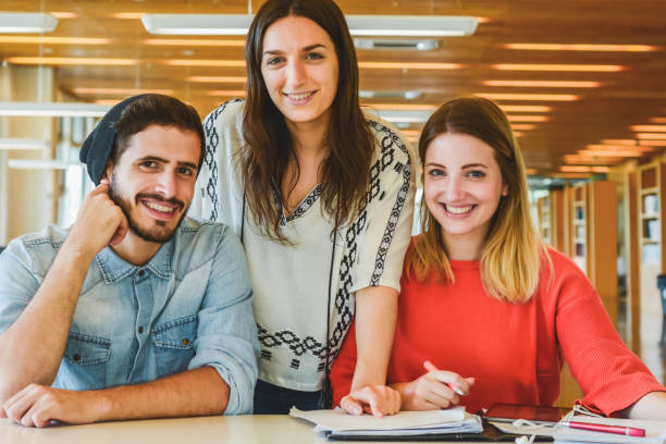 istock Group of young students studying together. 1277161116