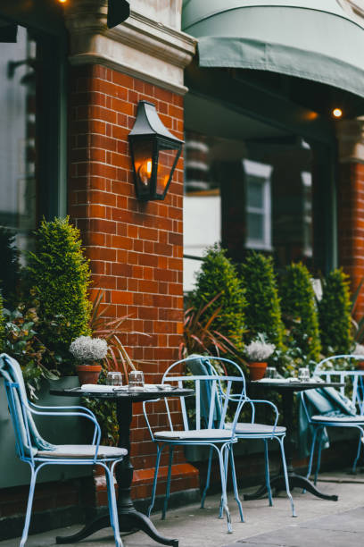 istock Empty coffee and restaurant terrace with tables and chairs in london sunset 1277162125
