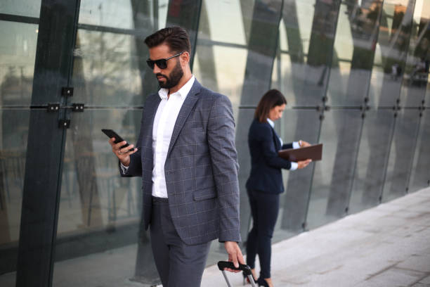 istock A handsome businessman talking on the phone 1277162365