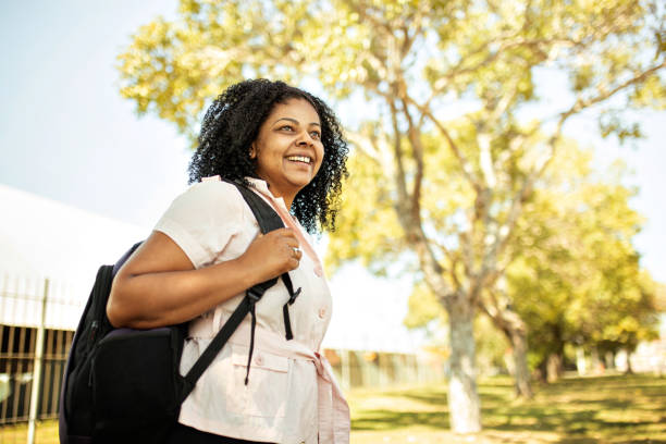 istock Woman with backpack outdoor portrait 1277166852