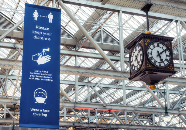 Government Coronavirus advice on banner in train station