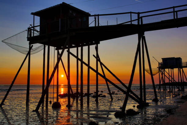 istock fisherman's huts french atlantic coast 1277168805