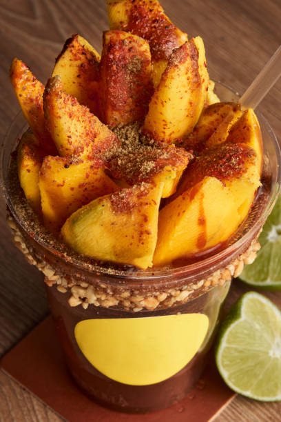 istock Refreshing drink with beer, spicy sauce, mango with chilli powder topping 1277170409