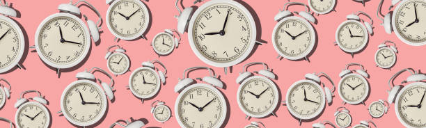 istock Vintage alarm clock pattern on a pink background, long banner 1277170466