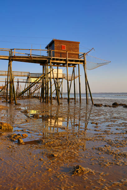 istock fisherman's huts french atlantic coast 1277171914