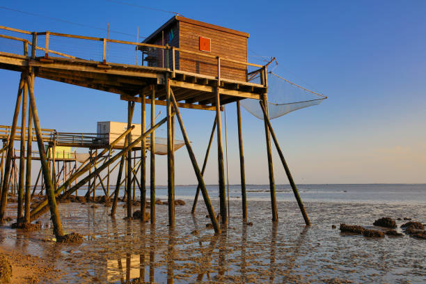 istock fisherman's huts french atlantic coast 1277172222