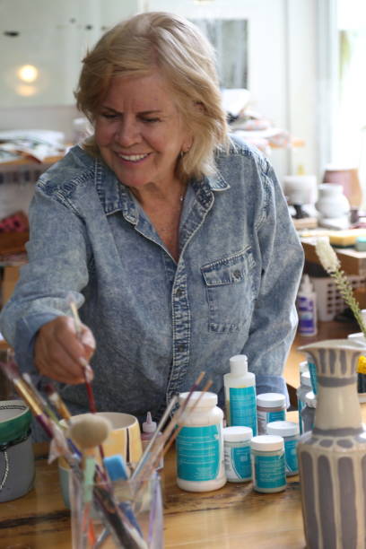 istock retired woman making pottery in her workshop 1277172337