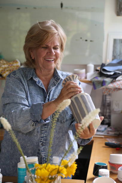 istock retired woman making pottery in her workshop 1277172423