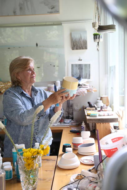istock retired woman making pottery in her workshop 1277172451