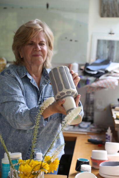 istock retired woman making pottery in her workshop 1277172524
