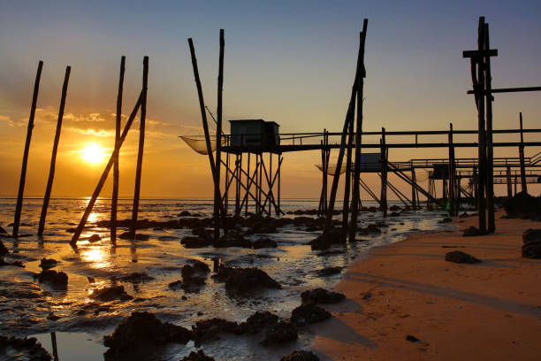 istock fisherman's huts french atlantic coast 1277172875
