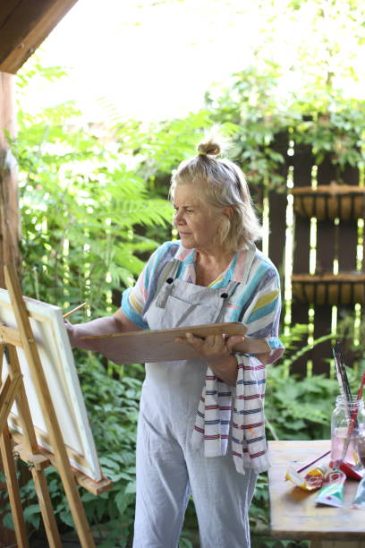 istock 70 years old women having pleasure doing art 1277172882