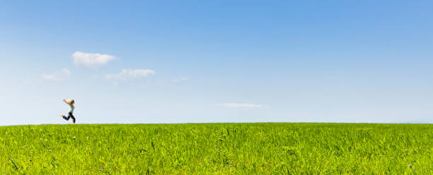 istock woman runs in a meadow 1277172943
