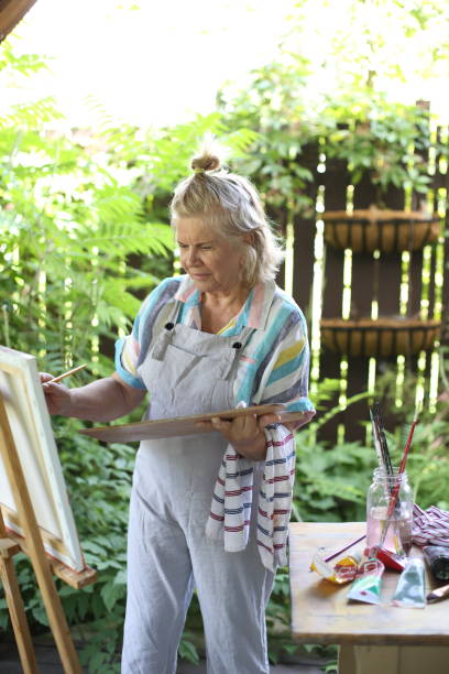 istock 70 years old women having pleasure doing art 1277172998