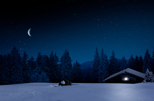 Ski hut at night in winter