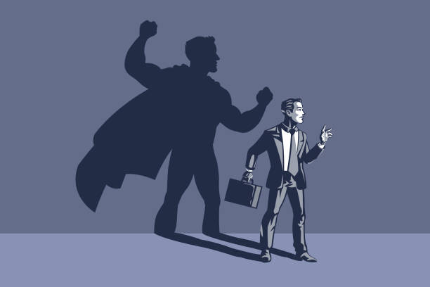 istock Illustration of Businessman Standing with His Shadow Superhero at the Wall 1277174738