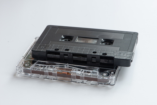 Retro plastic cassettes tape from 70s 80s 90s. Concept of music history. Top view.