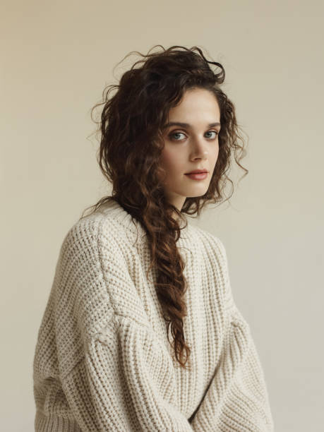 istock Young beautiful woman wearing beige sweater 1277177208