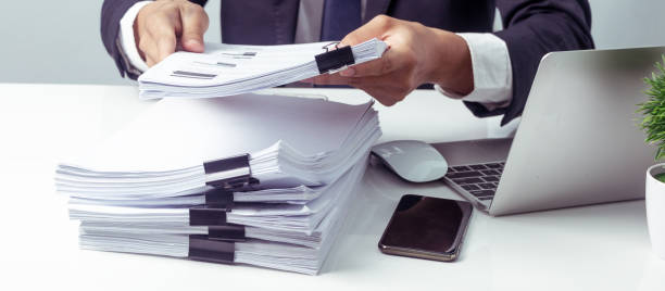 Businessman Receives Document from Chief, Business Report, Important Document stock photo