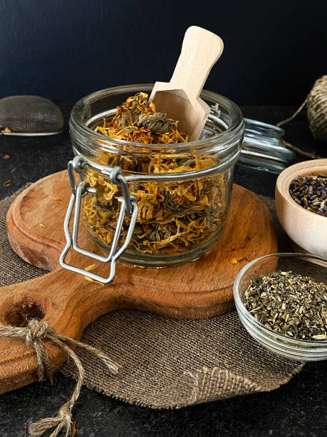 istock Calendula flowers in a glass jar. Useful herbal tea to boost immunity. 1277177929