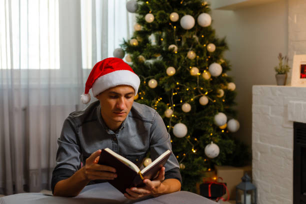 istock Young man on christmas day holding hands in pray, feels confident. 1277178329