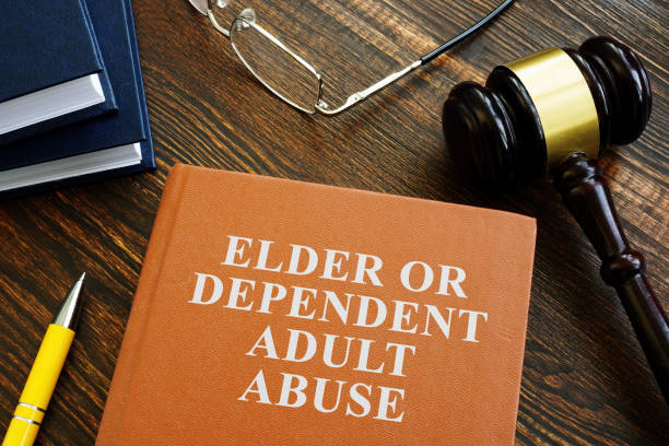 istock Elder or dependent adult abuse book and gavel. 1277179162